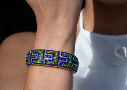 80DB Deco Anthem cuff in blue and green hues, showcasing architectural Art Deco inspired pattern with dramatic geometric elements