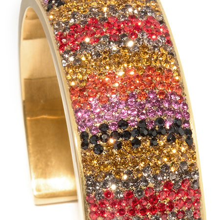 80DB Spectrum Symphony cuff featuring a vibrant multi-coloured crystal pattern that creates a bold visual symphony of red, yellow and striking hues